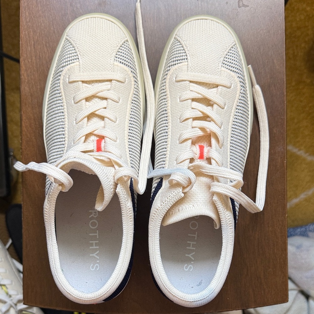 Rothy's Cream Knit Sneakers with Navy Heel and Red Tongue Tab